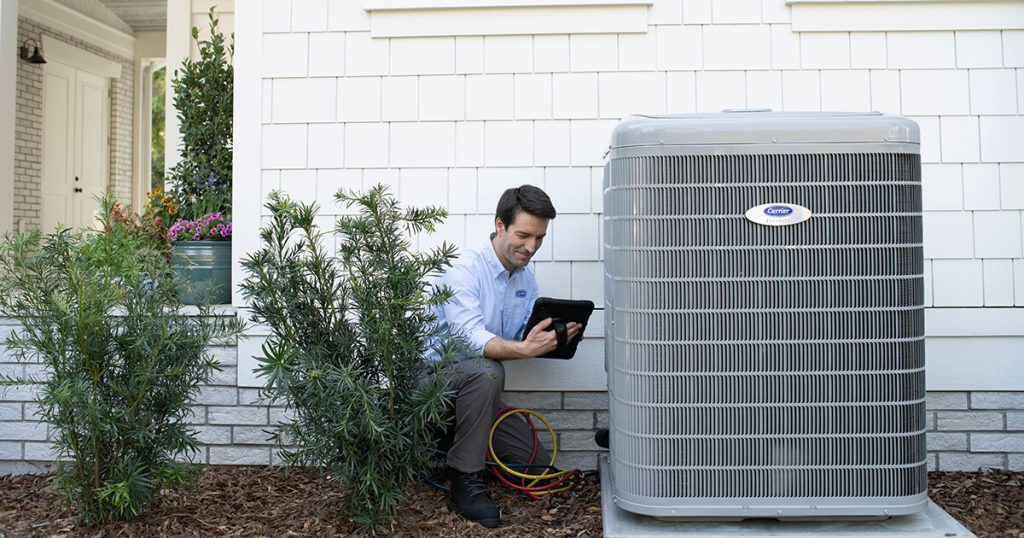 HVAC technician performing AC maintenance service HVAC Pro LLC Florida